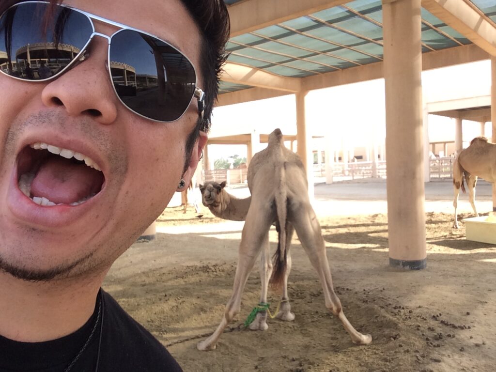 William Perry Moore from The Adarna meeting a Camel in Bahrain