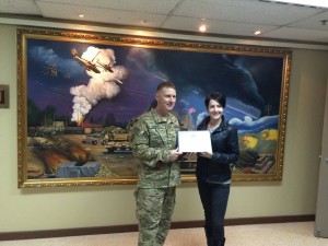 139 - Andreka receiving a gratitude plaque from the Base Commander in SW Asia