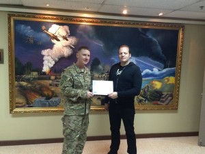 141 - Murdock receiving a gratitude plaque from the Base Commander in SW Asia