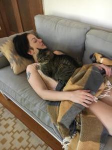 019 - Andreka getting some snuggles in with the most boogery cat ever